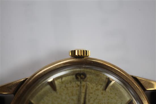 A gentlemans late 1950s 9ct gold Omega manual wind wrist watch,